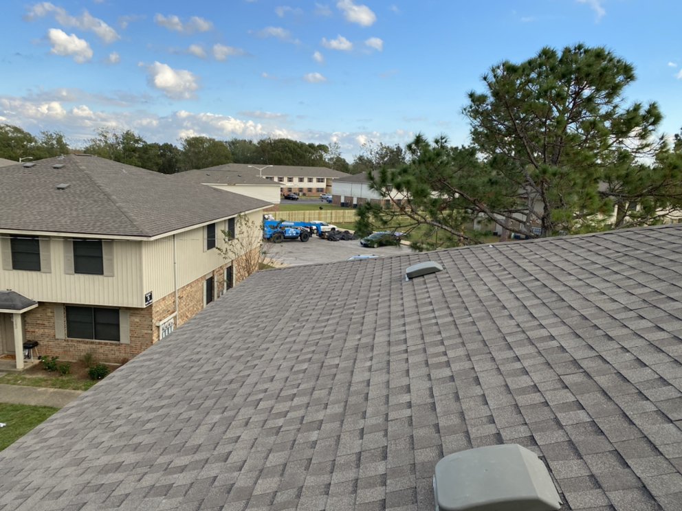 Slide of Migos Roofing