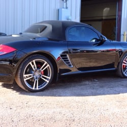 Xtreme Auto Re-Styling Center - Buff on a black Porsche....giving that black paint its shine again!