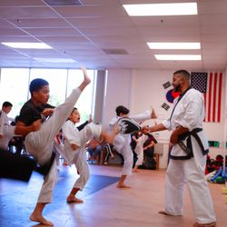 Valley Taekwondo Center - Mr. Smith warming up the students