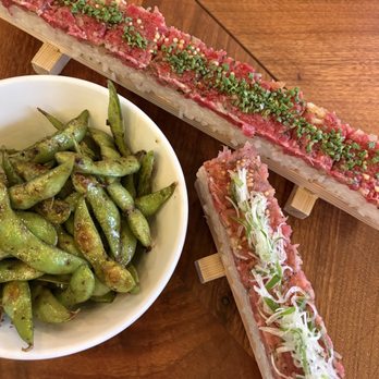 New Fuji - Left: Truffle edamame ($9) Top: Long Yukhoe sushi ($29) Bottom: Negitoro long pressed sushi ($29) - Japanese Near Me - Vancouver, British Columbia New Fuji - Left: Truffle edamame ($9) Top: Long Yukhoe sushi ($29) Bottom: Negitoro long pressed sushi ($29) - Japanese Near Me - Vancouver, British Columbia