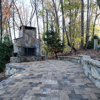 Zamora Design & Build - a brick patio with a fireplace - Lawn Services Near Me - Smyrna, Georgia