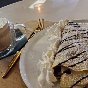 Krays Coffee - Nutella with strawberries & bananas crepe and a cup of white mocha - Coffee & Tea Near Me - Vancouver, Washington Krays Coffee - Nutella with strawberries & bananas crepe and a cup of white mocha - Coffee & Tea Near Me - Vancouver, Washington