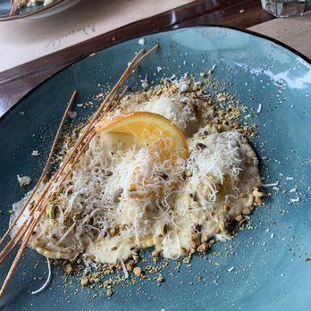 Napule - Ravioli with ricotta, orange and lemon zest in a light cream sauce with toasted pistachios! - Pizza Near Me - Sarasota, Florida Napule - Ravioli with ricotta, orange and lemon zest in a light cream sauce with toasted pistachios! - Pizza Near Me - Sarasota, Florida