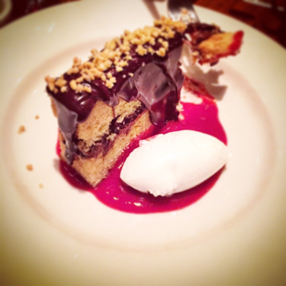 Local 111 - White chocolate cake with chocolate mousse, preserved raspberry sauce and toasted peanuts. - New American Near Me - Philmont, New York Local 111 - White chocolate cake with chocolate mousse, preserved raspberry sauce and toasted peanuts. - New American Near Me - Philmont, New York