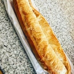 a long loaf of bread on a table