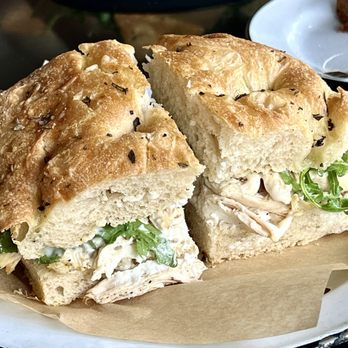 DERU Market - The roast chicken and goat cheese sandwich, arugula on house baked bread. - Pizza Near Me - Kirkland, Washington DERU Market - The roast chicken and goat cheese sandwich, arugula on house baked bread. - Pizza Near Me - Kirkland, Washington