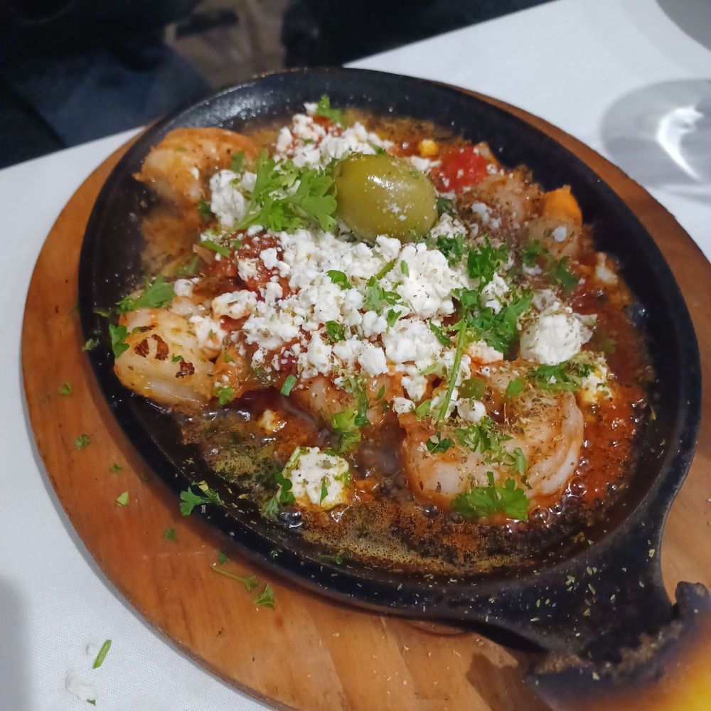 Petos - Saganaki shrimp - Greek Near Me - Carmel, Indiana Petos - Saganaki shrimp - Greek Near Me - Carmel, Indiana