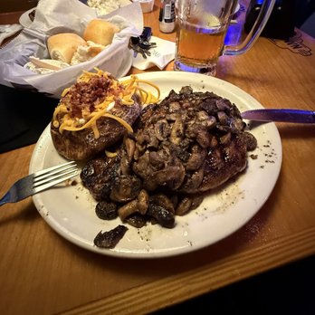 Texas Roadhouse - Ft. Worth Ribeye with smothered mushrooms on top and a loaded baked potato. - Steakhouses Near Me - Taylors, South Carolina Texas Roadhouse - Ft. Worth Ribeye with smothered mushrooms on top and a loaded baked potato. - Steakhouses Near Me - Taylors, South Carolina