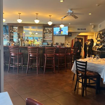 Sidewalk Bistro - tables and chairs in a restaurant - French Near Me - Piermont, New York