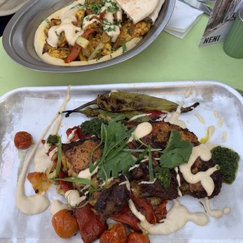 Neni - Chicken with hummus (back), another chicken entree with roasted veggies (front) - Middle Eastern Near Me - Vienna, 9