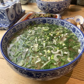 Kung Fu Noodle - The noodles - front is knife cut noodle, back is extra wide noodle in the beef noodle soup - Chinese Near Me - London, XGL