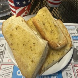 Garlic bread (sub bread sliced and toasted with garlic and butter)