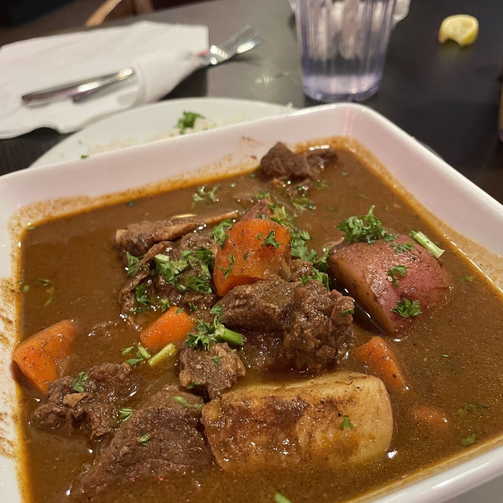 Jambo Cafe - Caribbean Goat Stew - Caribbean Near Me - Santa Fe, New Mexico Jambo Cafe - Caribbean Goat Stew - Caribbean Near Me - Santa Fe, New Mexico