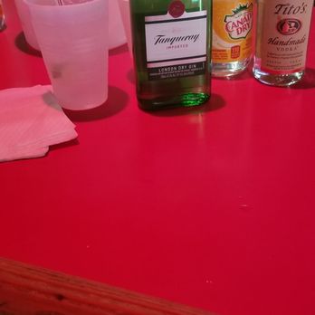 Bullet's Sports Bar - Order a set! It's a great deal rather than ordering individual drinks. You get the booze, mixer, bucket of ice, and fruit. Make your own! - Sports Bars Near Me - New Orleans, Louisiana