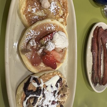 Snooze, an A.M. Eatery - Pancake flight- blueberry, strawberry shortcake, pineapple upside down, and side of bacon - Breakfast & Brunch Near Me - Tucson, Arizona Snooze, an A.M. Eatery - Pancake flight- blueberry, strawberry shortcake, pineapple upside down, and side of bacon - Breakfast & Brunch Near Me - Tucson, Arizona