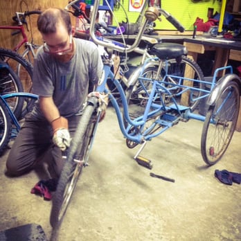ReCYCLEry - One of the volunteers cleaning up a trike - Bike Repair/Maintenance Near Me - Chapel Hill, North Carolina ReCYCLEry - One of the volunteers cleaning up a trike - Bike Repair/Maintenance Near Me - Chapel Hill, North Carolina