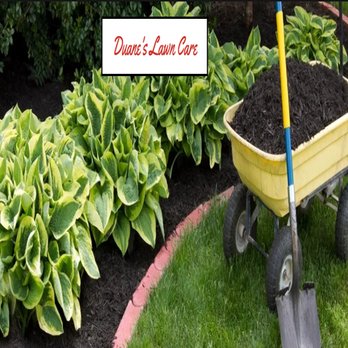 Duane's Lawn Care - a wheelbarrow in a garden - Tree Services Near Me Duane's Lawn Care - a wheelbarrow in a garden - Tree Services Near Me