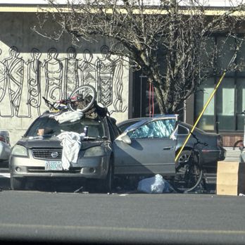 Albertsons - This vehicle has been here for weeks disassembling bikes - Grocery Near Me - Portland, Oregon