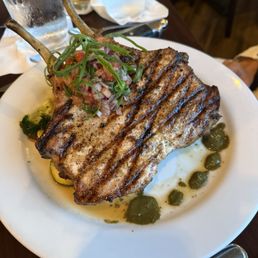 Tomahawk pork chop butterfly