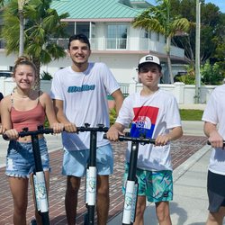 Blu Dolphin Rentals - Happy customers with their rentals