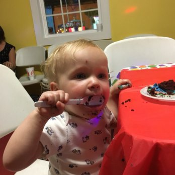 The Cake Mix - a toddler eating a piece of cake - Cooking Schools Near Me - Rincon, Georgia The Cake Mix - a toddler eating a piece of cake - Cooking Schools Near Me - Rincon, Georgia