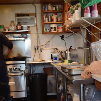 Aardvark Express - a man cooking in a commercial kitchen - Asian Fusion Near Me - Cle Elum , Washington Aardvark Express - a man cooking in a commercial kitchen - Asian Fusion Near Me - Cle Elum , Washington
