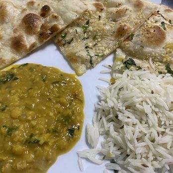 Indian Delicacies - Garlic Naan Moong Daal Butter Naan Small Plain Rice Special - Indian Near Me - Stockton, California Indian Delicacies - Garlic Naan Moong Daal Butter Naan Small Plain Rice Special - Indian Near Me - Stockton, California