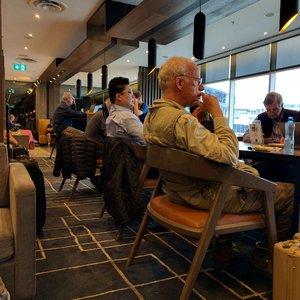 Photo of American Express Lounge - Mascot New South Wales, Australia. Small lounge. Crowded.