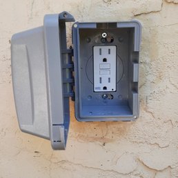 Outdoor outlet and weather protector. Outdoor outlet and weather protector.