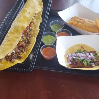 El Super Taco - Super machete with Frito de arbol sauce, barbacoa and asada meat. Street taco, Verde guacamole salsa, barbacoa meat. - Mexican Near Me - Burnsville, Minnesota El Super Taco - Super machete with Frito de arbol sauce, barbacoa and asada meat. Street taco, Verde guacamole salsa, barbacoa meat. - Mexican Near Me - Burnsville, Minnesota
