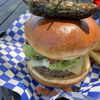 The Lighthouse Restaurant & Lounge - Guacamole Explosion Burger - Bars Near Me - Spicewood, Texas
