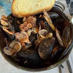 Miky - Seafood pot, full of clams, mussels and octopus. This was really good!