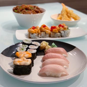 Sushi Mori - various types of sushi on plates - Sushi Bars Near Me - Coquitlam, British Columbia Sushi Mori - various types of sushi on plates - Sushi Bars Near Me - Coquitlam, British Columbia