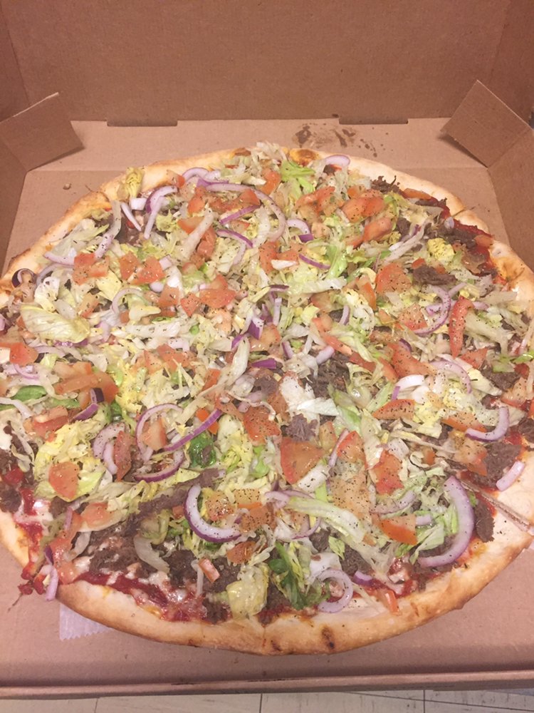 Crazy Cow Steak and Pizza Logo
