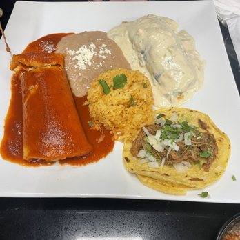 Sofias Bar And Grill - Combo dinner plate with red sauce beef enchilada, beef taco, and chile relleno with poblano cream sauce - New Mexican Cuisine Near Me - Modesto, California