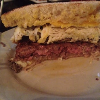 Dogfish Head Brewings & Eats - Cross section of the Scrapple Burger - American Near Me - Rehoboth Beach, Delaware Dogfish Head Brewings & Eats - Cross section of the Scrapple Burger - American Near Me - Rehoboth Beach, Delaware