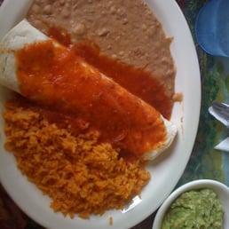 Bean buriito con no queso and a side of guacamole. Bean buriito con no queso and a side of guacamole.