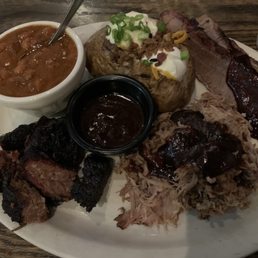 Pulled pork, brisket, burnt ends, beans, loaded baked potato. Pulled pork, brisket, burnt ends, beans, loaded baked potato.