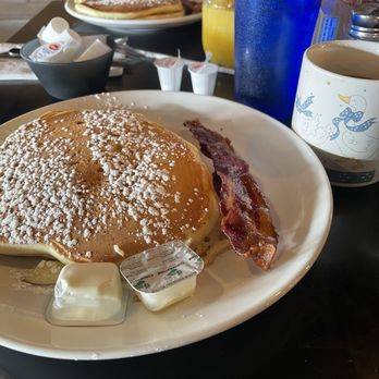 Otto's Kitchen & Comfort - Two orders of Pancakes and bacon, with coffee and orange juice. - Breakfast & Brunch Near Me - Pittsfield, Massachusetts Otto's Kitchen & Comfort - Two orders of Pancakes and bacon, with coffee and orange juice. - Breakfast & Brunch Near Me - Pittsfield, Massachusetts