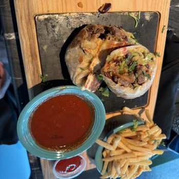 La Cantinita - Birria Burrito with fries and tomatillo sauce - Mexican Near Me - Royal Palm Beach, Florida La Cantinita - Birria Burrito with fries and tomatillo sauce - Mexican Near Me - Royal Palm Beach, Florida