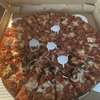Mountain Mike's Pizza - That there is a pizza with pepperoni and mushroom - Pizza Near Me - Costa Mesa, California