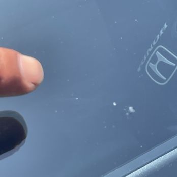 Joe's Windshield Repair - Joe's finger pointing at the fixed screen. Ignore my dirty car! - Auto Glass Services Near Me Joe's Windshield Repair - Joe's finger pointing at the fixed screen. Ignore my dirty car! - Auto Glass Services Near Me