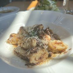 Olivea - Beef cheek gnocchi - Caesar salad in background