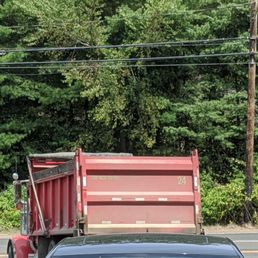 Cherry Hill truck driver #24 giving the middle finger in his driver's mirror after almost causing an accident and verbally attacking me.