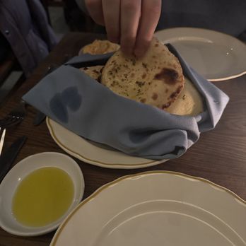 Gus and Marty's - Warm pita and olive oil - Greek Near Me - Brooklyn, New York Gus and Marty's - Warm pita and olive oil - Greek Near Me - Brooklyn, New York