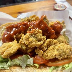 Ernie B's - These oysters rocked! Huge, meaty, salty, perfectly cooked! Oh but yum!