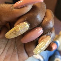 Nails poorly painted, I picked a gel color she completely put a total opposite color on my nails,