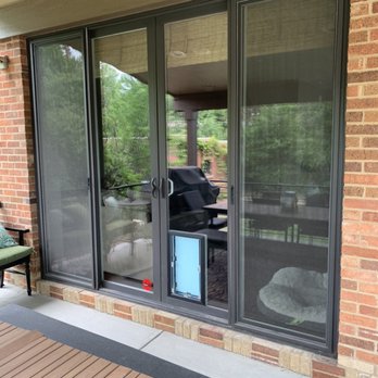 Through the Glass Dog Doors - In Glass Dog Door - bronze outside frame to match slider frame - Pet Services Near Me Through the Glass Dog Doors - In Glass Dog Door - bronze outside frame to match slider frame - Pet Services Near Me