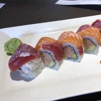 Shinsei Sushi - Top shelf sushi roll , had coconut milk drizzled on top. - Japanese Near Me - Medford, Oregon