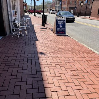 Blue Collie Coffee - a brick sidewalk in a small town - Coffee & Tea Near Me - Louisburg, North Carolina